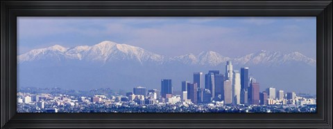 Framed Buildings in a city with snowcapped mountains in the background, San Gabriel Mountains, City of Los Angeles, California, USA Print