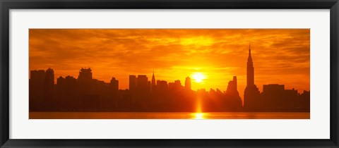 Framed Birght Orange Sky and Sun Behind the New York City Skyline Print