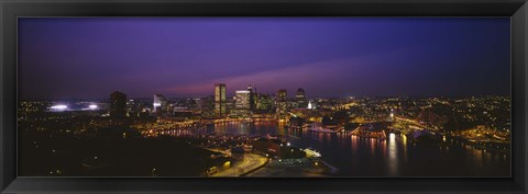 Framed Aerial view of a city lit up at dusk, Baltimore, Maryland, USA Print