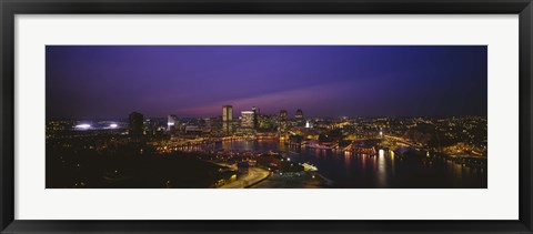 Framed Aerial view of a city lit up at dusk, Baltimore, Maryland, USA Print