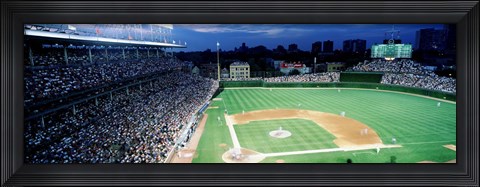 Framed Cubs baseball game under flood lights, USA, Illinois, Chicago Print