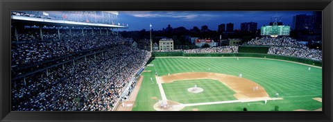 Framed Cubs baseball game under flood lights, USA, Illinois, Chicago Print