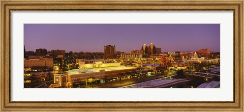 Framed High angle view of buildings lit up at dusk, Kansas City, Missouri, USA Print