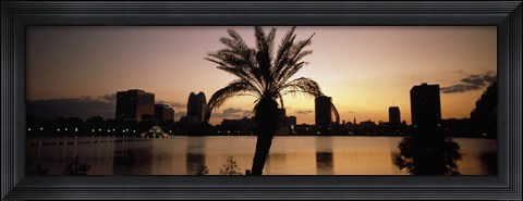 Framed Silhouette of buildings at the waterfront, Lake Eola, Summerlin Park, Orlando, Orange County, Florida, USA Print