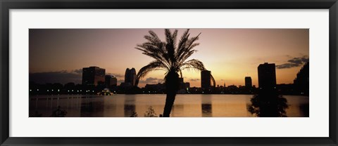 Framed Silhouette of buildings at the waterfront, Lake Eola, Summerlin Park, Orlando, Orange County, Florida, USA Print