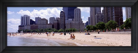 Framed Group of people on the beach, Oak Street Beach, Chicago, Illinois, USA Print