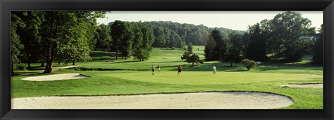 Framed Four people playing on a golf course, Baltimore County, Maryland, USA Print