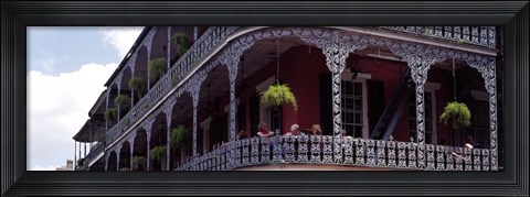 Framed People sitting in a balcony, French Quarter, New Orleans, Louisiana, USA Print