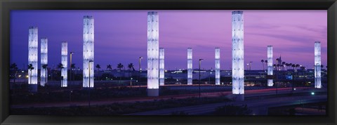 Framed Light sculptures lit up at night, LAX Airport, Los Angeles, California, USA Print