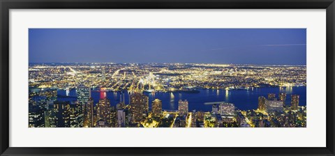 Framed Aerial View Of Buildings Lit Up At Dusk, Manhattan Print