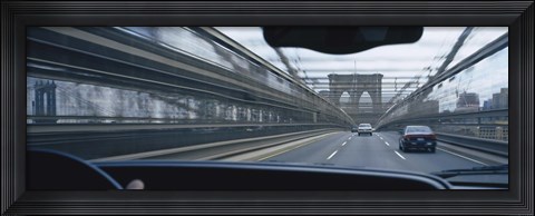 Framed Cars moving on the bridge, Brooklyn Bridge, New York City, New York State, USA Print