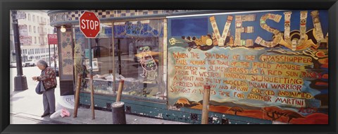 Framed USA, California, San Francisco, Little Italy, Senior man standing outside a bar Print