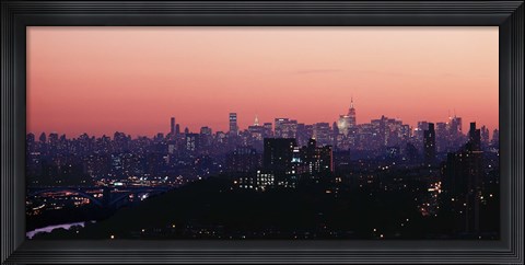 Framed High angle view of buildings lit up at dusk, Manhattan, New York City, New York State, USA Print