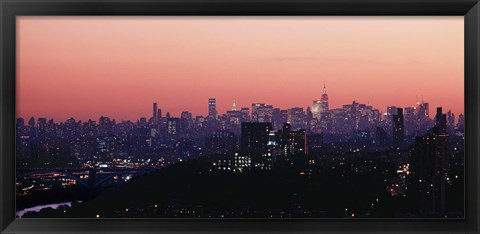 Framed High angle view of buildings lit up at dusk, Manhattan, New York City, New York State, USA Print