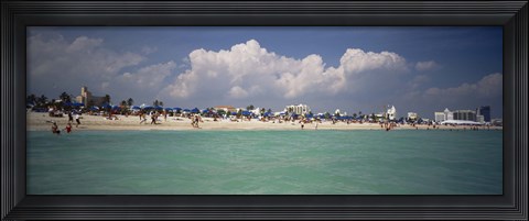 Framed Tourists on the beach, Miami, Florida, USA Print