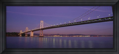 Framed Low angle view of a bridge at dusk, Oakland Bay Bridge, San Francisco, California, USA Print