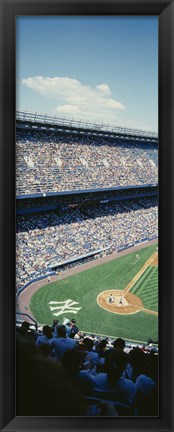 Framed High angle view of spectators watching a baseball match in a stadium, Yankee Stadium, New York City, New York State, USA Print