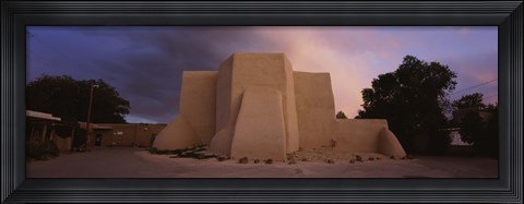 Framed Overcast clouds sky over a church, San Francisco de Asis Church, Ranchos De Taos, New Mexico, USA Print