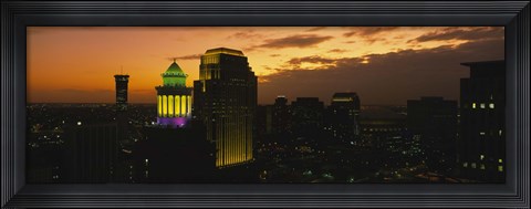 Framed High angle view of buildings lit up at dusk, New Orleans, Louisiana, USA Print