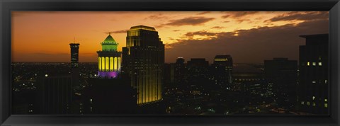 Framed High angle view of buildings lit up at dusk, New Orleans, Louisiana, USA Print