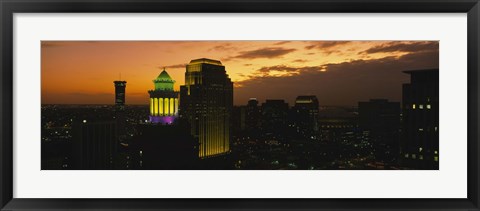 Framed High angle view of buildings lit up at dusk, New Orleans, Louisiana, USA Print