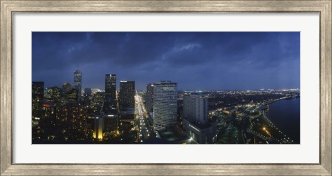 Framed High angle view of buildings in a city lit up at night, New Orleans, Louisiana, USA Print