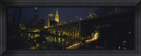 Framed Arch bridge and buildings lit up at night, Cleveland, Ohio, USA Print