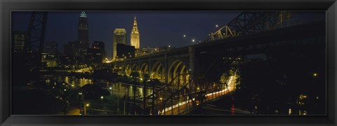 Framed Arch bridge and buildings lit up at night, Cleveland, Ohio, USA Print