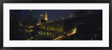 Framed Arch bridge and buildings lit up at night, Cleveland, Ohio, USA Print