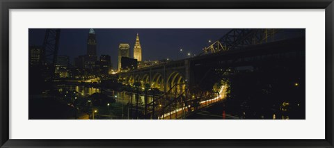 Framed Arch bridge and buildings lit up at night, Cleveland, Ohio, USA Print