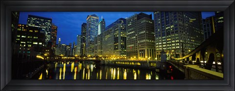 Framed Low angle view of buildings lit up at night, Chicago River, Chicago, Illinois, USA Print