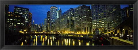 Framed Low angle view of buildings lit up at night, Chicago River, Chicago, Illinois, USA Print