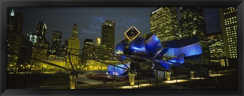 Framed Low angle view of buildings lit up at night, Pritzker Pavilion, Millennium Park, Chicago, Illinois, USA Print