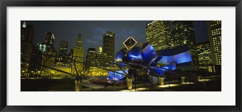 Framed Low angle view of buildings lit up at night, Pritzker Pavilion, Millennium Park, Chicago, Illinois, USA Print