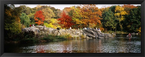 Framed Group of people sitting on rocks, Central Park, Manhattan, New York City, New York, USA Print