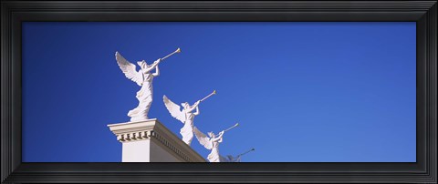 Framed Low angle view of statues on a wall, Caesars Place, Las Vegas, Nevada, USA Print