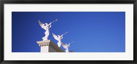 Framed Low angle view of statues on a wall, Caesars Place, Las Vegas, Nevada, USA Print