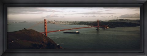 Framed Barge passing under a bridge, Golden Gate Bridge, San Francisco, California, USA Print