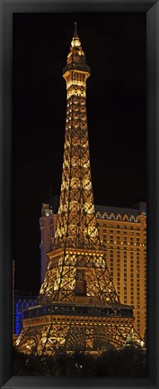 Framed Replica of the Eiffel Tower lit up at night, Paris Las Vegas, Las Vegas, Nevada, USA Print