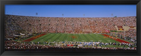 Framed High angle view of a football stadium full of spectators, Los Angeles Memorial Coliseum, City of Los Angeles, California, USA Print