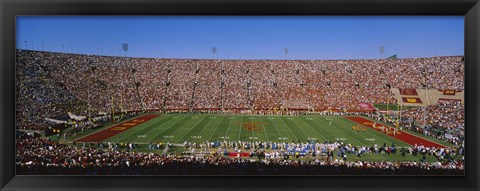 Framed High angle view of a football stadium full of spectators, Los Angeles Memorial Coliseum, City of Los Angeles, California, USA Print