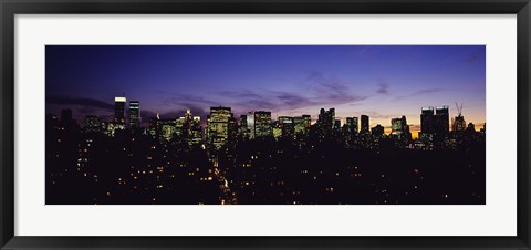 Framed Skyscrapers in a city lit up at night, Manhattan, New York City, New York State, USA Print