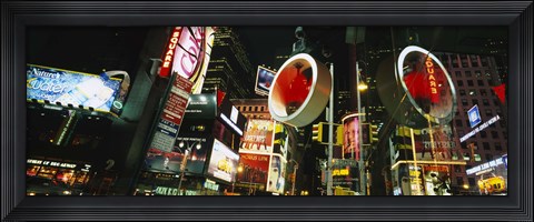 Framed Low angle view of buildings lit up at night, Times Square, Manhattan, New York City, New York State, USA Print