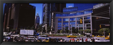 Framed Traffic on the road in front of buildings, Columbus Circle, Manhattan, New York City, New York State, USA Print