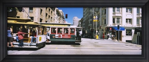 Framed Two cable cars on a road, Downtown, San Francisco, California, USA Print