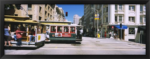 Framed Two cable cars on a road, Downtown, San Francisco, California, USA Print