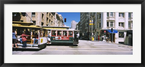 Framed Two cable cars on a road, Downtown, San Francisco, California, USA Print