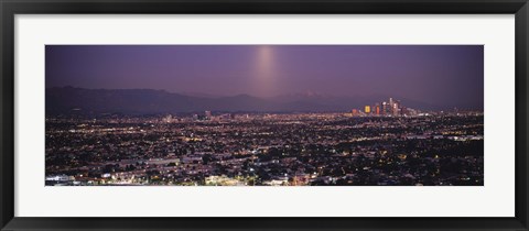 Framed Buildings in a city lit up at dusk, Hollywood, San Gabriel Mountains, City Of Los Angeles, Los Angeles County, California, USA Print