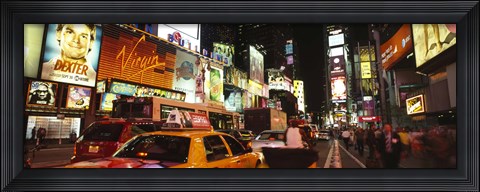 Framed Buildings lit up at night in a city, Broadway, Times Square, Midtown Manhattan, Manhattan, New York City, New York State, USA Print
