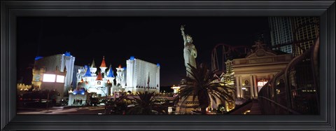 Framed Statue in front of a hotel, New York New York Hotel, Excalibur Hotel And Casino, The Las Vegas Strip, Las Vegas, Nevada, USA Print
